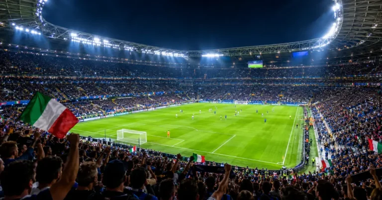 calcio streaming: stadio italiano di notte con tifosi sulle tribune